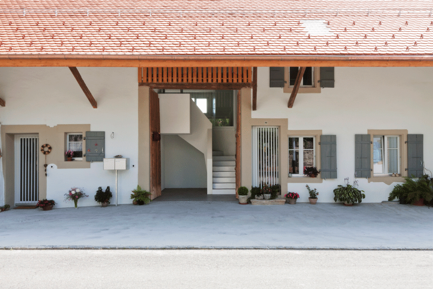 Transformation d'une maison villageoise en 2 appartements